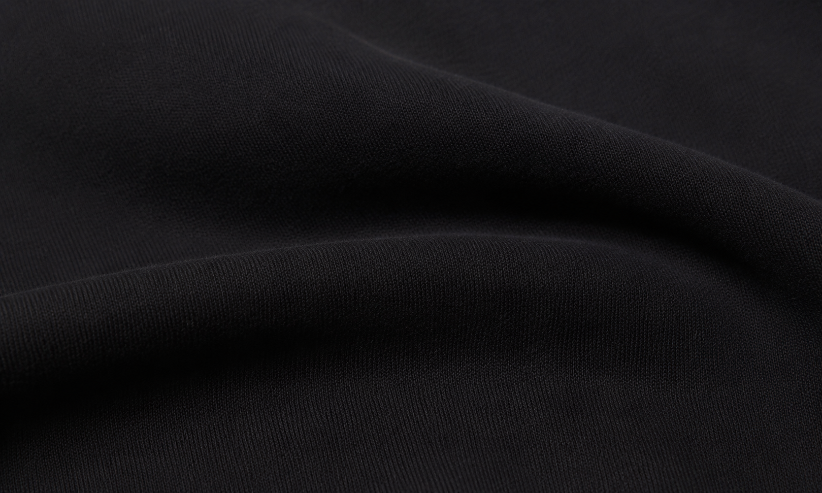 STONE ISLAND ORGANIC COTTON FLEECEの滑らかでマットな表面感を表現したイメージ